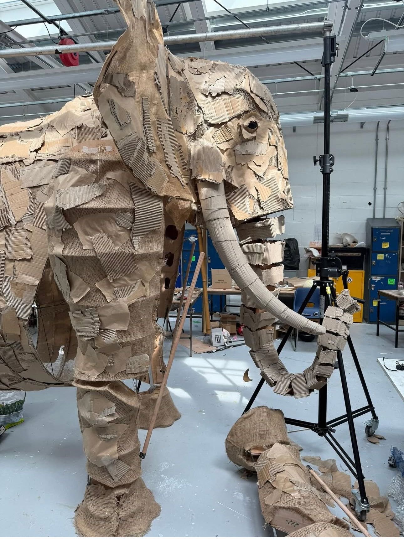 Large elephant puppet in workshop engineering process